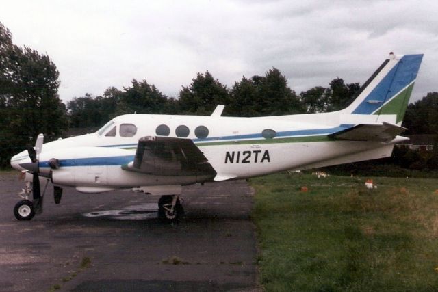 Beechcraft King Air 90 (N12TA) - Seen here Aug-88.  Since reregistered D-IAXX, N380AA and N984MA.