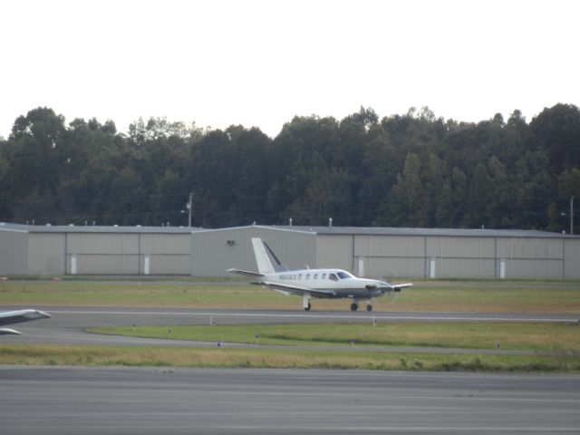 Socata TBM-850 (N850DX) - A Socata TBM-850 Taxiing To The Ramp At Manassas Reginal Airport