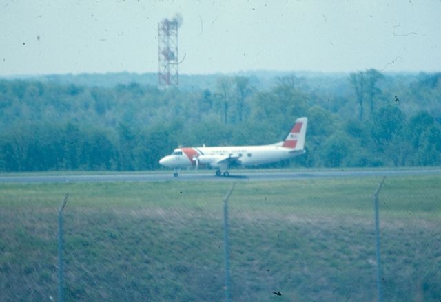 Grumman Gulfstream 1 — - Coast Guard Grumman Gulfstream G1 on runway 15 at KBWI (then known as Friendship International Airport). Sorry about the fuzzy focus, but at the time I was shooting KodaColor 400 speed with a 70-200 mm zoom lens and the range for this phot meant the 200 mm setting