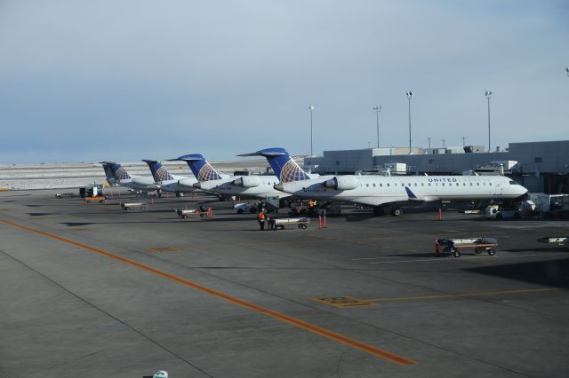 Canadair Regional Jet CRJ-700 (N745SK) - A multitude of regional aircraft in this photo.br /Visible Registration numbers are belowbr /N745SK,N726SK,N11127...(Rest is not visible)