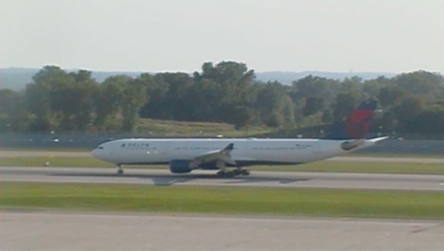 Airbus A330-300 (N811NW) - Shot from the red ramp parking garage