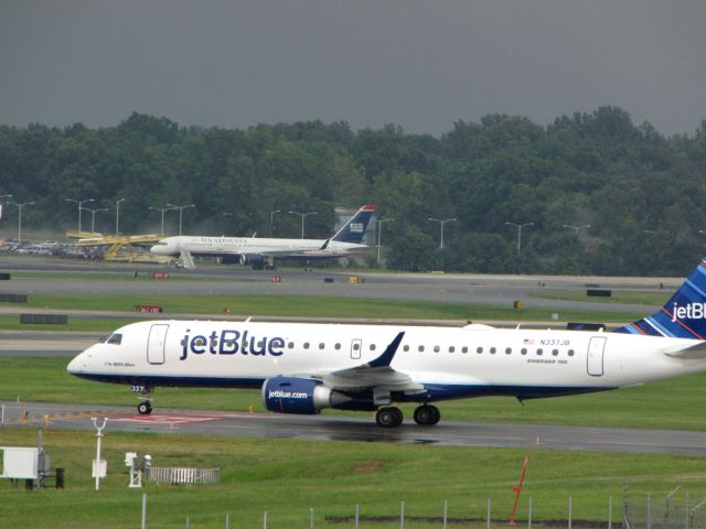 Embraer ERJ-190 (N337JB) - JUNE 2013, TAXIING (WAITING TO CROSS 18C)