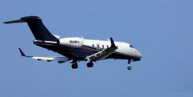 Bombardier Challenger 300 (N548FX) - About to touch down is this 2012 Bombardier Challenger 300 in the Summer of 2024.