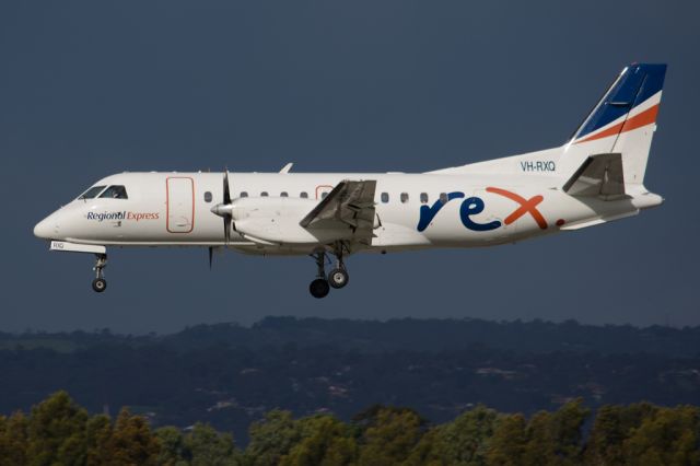 Saab 340 (VH-RXQ) - On short finals for runway 05. Thursday, 19 June 2014.