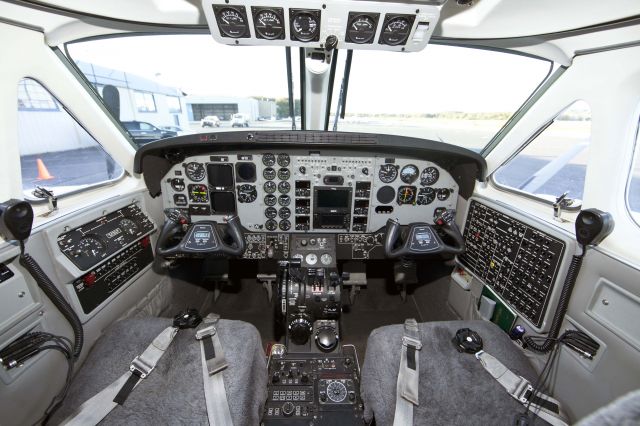 Beechcraft King Air 90 (N331JP) - Photo taken with a Canon 5D MarkII and 14mm ultra wide-angle lens. This is RELIANT AIRs new King Air 90. RELIANT AIR has the lowest fuel price on the Danbury (KDXR) airport.