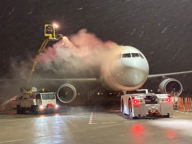 Airbus A300F4-600 (N674FE) - "Mark" is getting a quick shot of Type 1 Deicing Fluid during a heavy wet snowfall on Monday night March 15 '21.  Flight 325 is a few minutes away from a speedy departure to Madison, WI followed by Memphis.