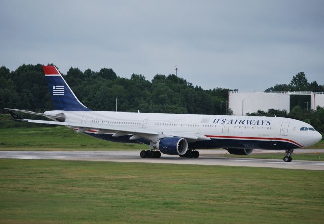 Airbus A330-300 (N273AY) - Rolling 18C - 7/12/10