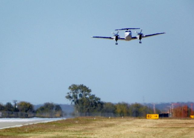 — — - Standing on berm at the south end of the runway looking north.