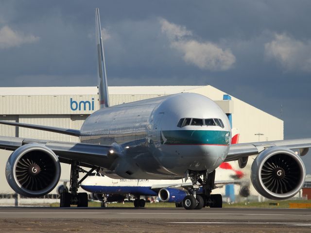 Boeing 777-200 (B-KPC) - Cathay Pacific, B777-300ER lines up on runway 027R at LHR.