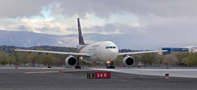 Airbus A300F4-600 (N148UP) - UPS's N148UP visited Reno-Tahoe International yesterday (29 Jan 2020). I checked my logbook and found I had taken a picture of N148UP several years ago, so I went back thru my digital storage units for the year 2013 and found my photos of this A306.br /Taken in April of 2013 with my old Canon T3i, this pic is an early morning (6:46 AM) capture of UPS's N148UP after it had crossed runway 34L on Taxiway Poppa and was preparing to line up for departure on Runway 34R.