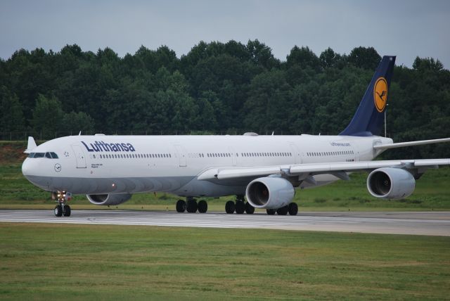 Airbus A340-600 (D-AIHM) - Taxiing into position 18C - 7/12/10