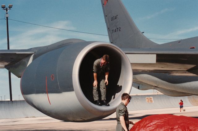 Boeing C-135FR Stratotanker (57-1472) - Airmen preparing a KC-135 for an air show at Carswell AFB during the mid 1980s