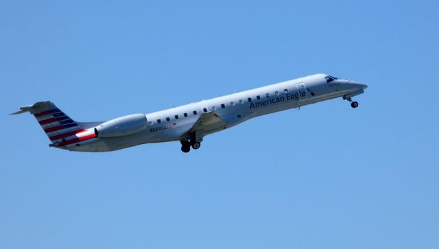 Embraer ERJ-145 (N660CL) - Shown here departing is an American Eagle Embraer ERJ-145 departing in the Spring of 2018.  I manage to photo this plane in Philadelphia, Ottawa, and Watertown NY just by coincidence. 