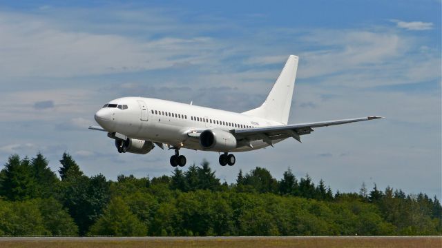 Boeing 737-700 (N565WN) - An off lease Ex-China Eastern B737 (Ex #B-2680) from RJCC/CTS via PANC on final to Rwy 34L on 7/4/14. (LN:1143 / cn 30282). The aircraft will be refurbished at ATS before going into service with SWA.