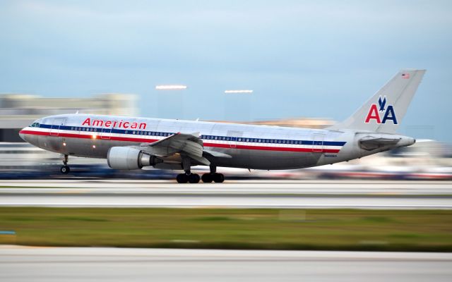 Airbus A300F4-600 (N80084) - Low light takeoffs can create awesome blur in the background, rotating off R 8R @ MIA