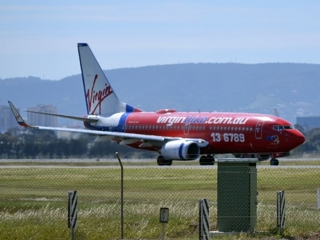 Boeing 737-700 (VH-VBO) - On taxi-way, heading for take off on runway 05.