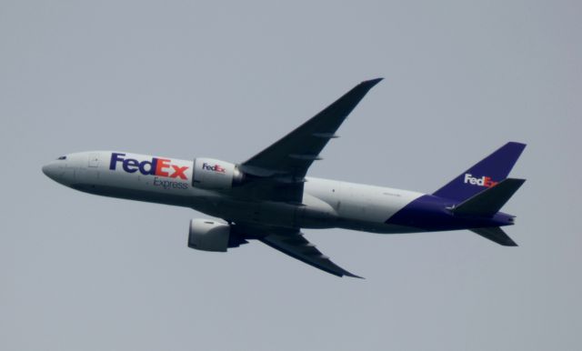 BOEING 777-200LR (N854FD) - FedEx B777-FS2 N854FD on its way fro CGN to CDG as flight FX5030. Photo made southeast of CGN in the Hennef area, 15.04.2023.