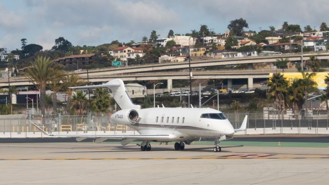 Canadair Challenger 350 (N754QS) - Waiting on the taxilane at San Diego.