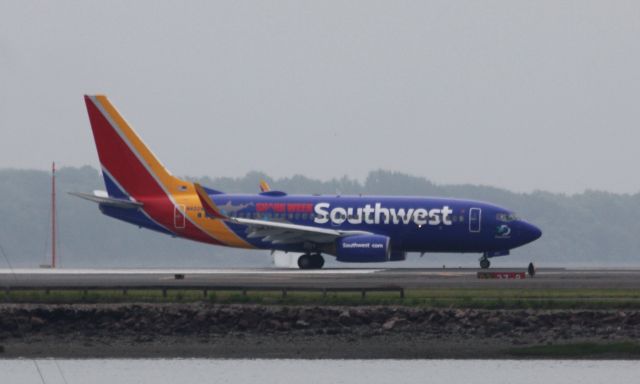 Boeing 737-700 (N422WN) - Southwest special scheme celebrating Shark Week departing Boston Logan.