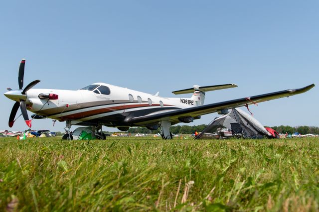 Pilatus PC-12 (N361PE) - Always love seeing the bigger turboprops slummin' it in the grass with the other smaller GA aircraft at Oshkosh. This is what aviation is all about!