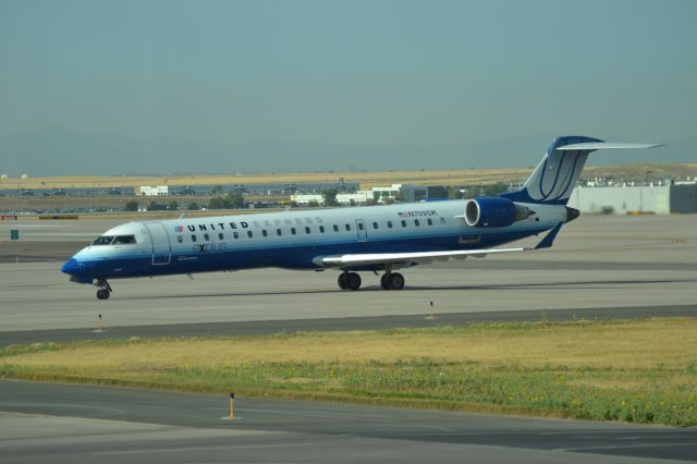 Canadair Regional Jet CRJ-700 (N709SK) - Taxiing to gate after landing in DEN