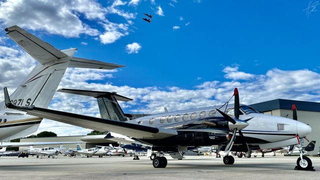 Beechcraft Super King Air 350 (N512ME) - A 1991 Beechcraft B300 Super King Air 350 w/ the US Navy’s EA-18G Growler Demo Team in formation above. 7/28/22. 