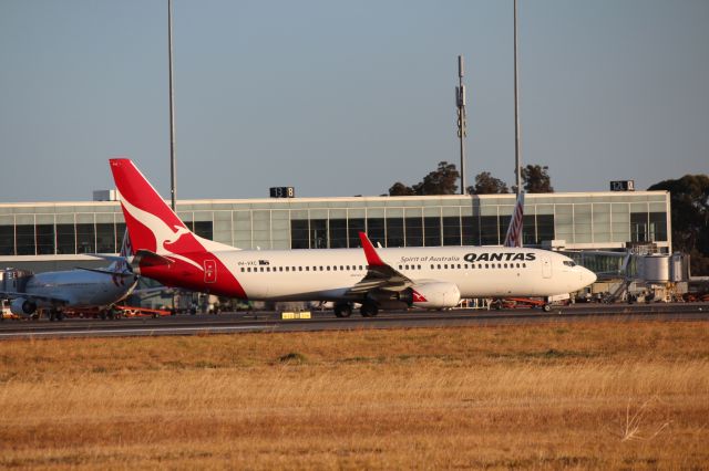 Boeing 737-800 (VH-VXC) - Qantas VH-VXC at Adelaide Airport taxiing to runway 23. Departing Adelaide for Sydney.