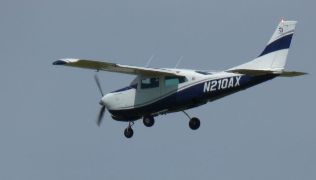 Cessna Centurion (N210AX) - On final is this 1979 Cessna Centurion II T210N in the Spring of 2020. 