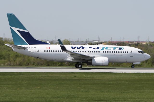 Boeing 737-700 (C-GWJO) - May 12, 2009 - on take off roll from Toronto