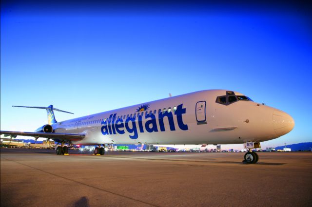 McDonnell Douglas MD-83 (N876GA) - Going thru some old photos and dug up this beauty. My friend happens to be a ramp agent at KLAS. He took this amazing shot of Allegiants MD-83 over a decade ago at a remote stand at the brink of dawn. Sadly these iconic birds wont be around much longer