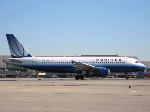 Airbus A320 (N467UA) - Holding on RWY 19R