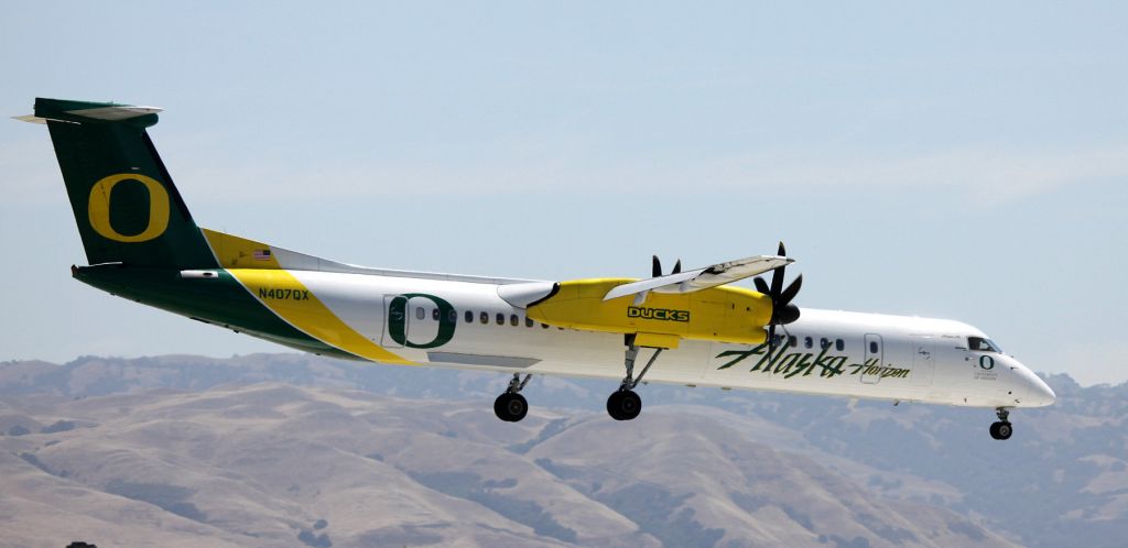 de Havilland Dash 8-100 (N407QX) - Arrival, landing 12R  06-05-2015 .. This image was titled, "One Shot Wonder" by a friend, because of how it turned out, and I only had one opportunity to capture it, at the time of this arrival