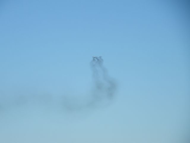 UR-CAK — - UR-CAK AFTER DEP EINN WITH SMOKE TRAIL SEEN FROM PLANE AS IT FLEW AWAY MADE IT A LOVELY SIGHT AND EASY TO PICK IT OUT IN THE SKY