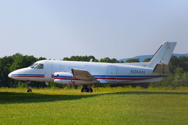 Embraer EMB-110 Bandeirante (N24AN) - N24AN Embraer EMB-110 Bandeirante (twin-turboprop) E110/G at William H. Morse State Airport KDDH (Bennington, VT).  Photo taken by Christopher Wright.