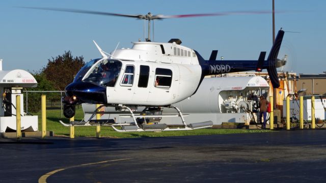 Bell JetRanger (N9BQ) - LINDEN AIRPORT-LINDEN, NEW JERSEY, USA-SEPTEMBER 03, 2019: A news helicopter belonging to one of the local New York City television stations is seen taking off shortly after refueling. Notice the "thumbs up" from the cameraman in the back seat and the camera pointing towards your photographer.