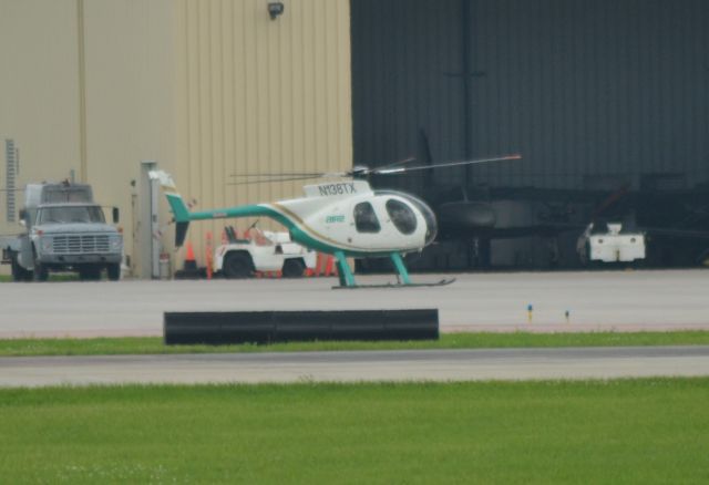 N138TX — - Hughes 369D N138TX sitting on tarmac after arriving in Sioux Falls SD on 6-12-15