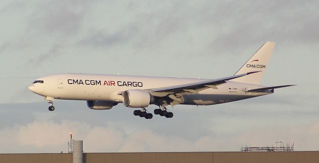 BOEING 777-200LR (F-HMRF) - A CMA CGM air Cargo (operated by Air Belgium) on final approach into LHR, landing on runway 27R.br /br /Location: Great South-West Road.br /Date: 21.12.22 (dd/mm/yy).