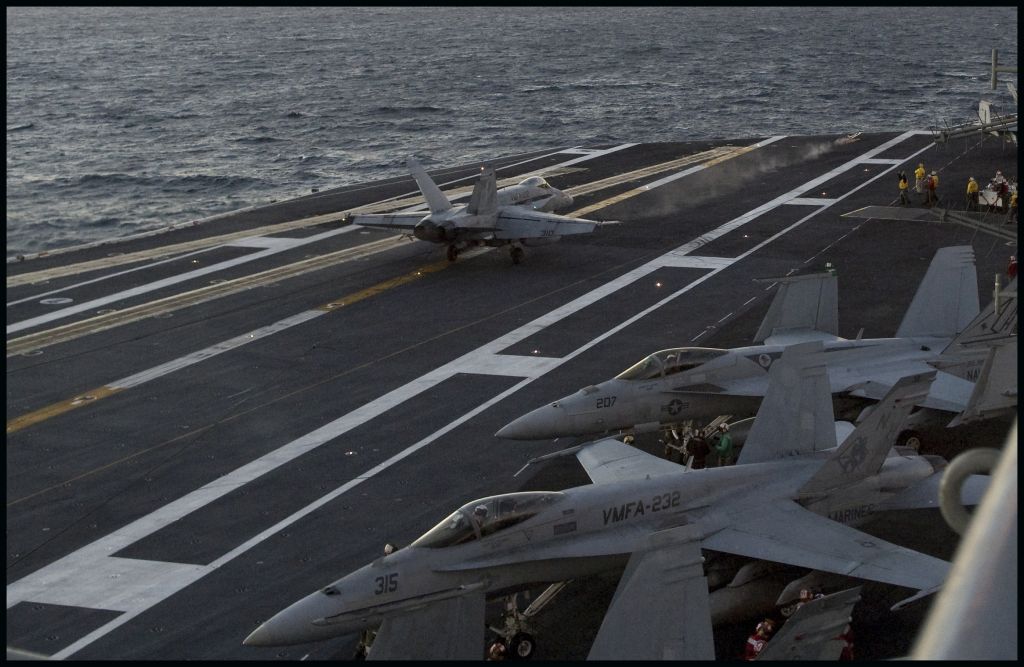 — — - VFMA-232 Red Devil uncommanded release of HARM missle. Missle skids off the flight deck