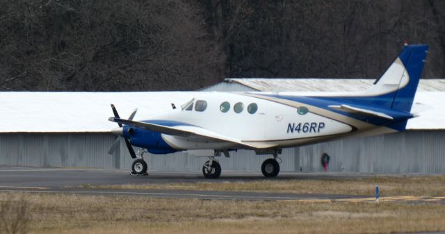 Beechcraft King Air 90 (N46RP) - Catching some tarmac time is this 1976 Beech E90 King Air on New Years day 2024.