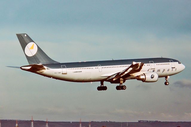 Rockwell Commander 114 (VH-YMK) - COMPASS AIRLINES (MONARCH AIRLINES) - AIRBUS A300B4-605R - REG : VH-YMK (CN 556) - WEST BEACH ADELAIDE SA. AUSTRALIA - YPAD (20/7/1991) 35MM SLIDE CONVERSION