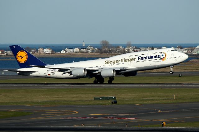 BOEING 747-8 (D-ABYI) - Fanhansa lifting off against the backdrop of Winthrop, Massachusetts