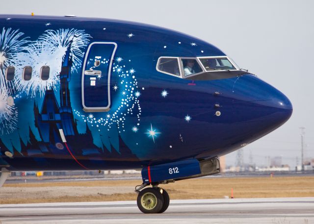 Boeing 737-800 (C-GWSZ) - Westjets Disney aircraft departing YYZ.