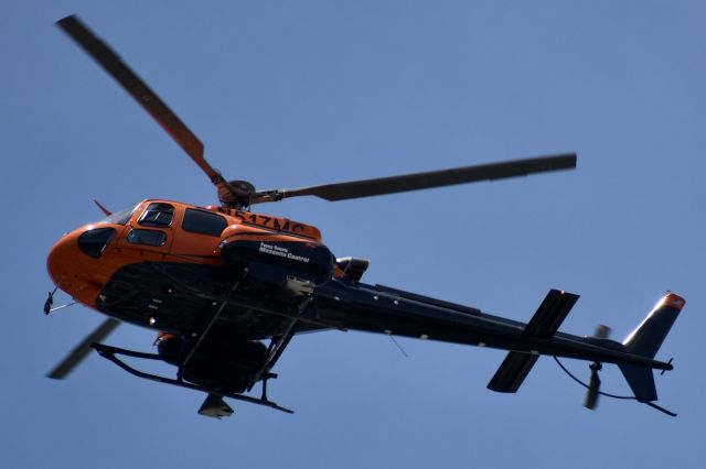 Eurocopter AS-350 AStar (N517MC) - Pasco County mosquito control helicopter flying over Holiday at 500 feet.