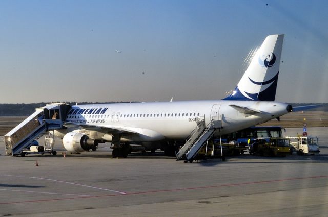 Airbus A320 (EK-32001) - Feb.2003: Damaged beyond repair at a fire at Zavetem Airport Belgium on 05-May-06 
