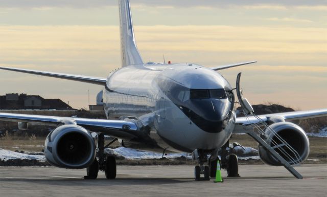 Boeing 737-700 (N101TD) - Indy Colts' plane on the FBO at BUF with a beautiful sunset in the background! Very very very rare plane.