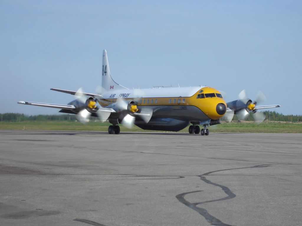 Lockheed L-188 Electra (C-GHZI) - Air Spray Lockheed L-188 Long Liner converted from passenger aircraft to waterbomber. Loaded up with retardant and taxiing for departure at Fort McMurray, Alberta, Canada, June 6th, 2008. One of the Airspray Electras was the team plane of the Los Angeles Dodgers in the early 1960s! Tanker 484