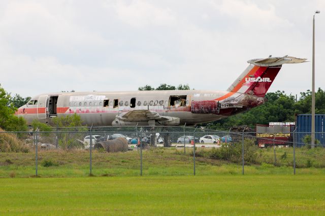 N1117J — - US air BAC-111204AF sitting at MCO used for fire training.