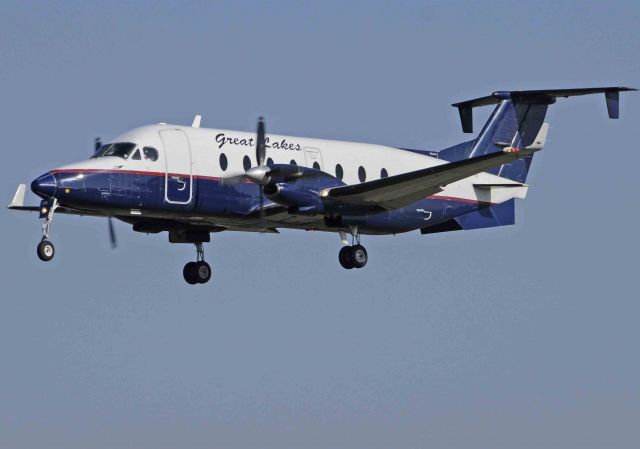 Beechcraft 1900 (N245GL) - Great Lakes Beechcraft 1900 on final, runway one-two, Merced Regional Airport