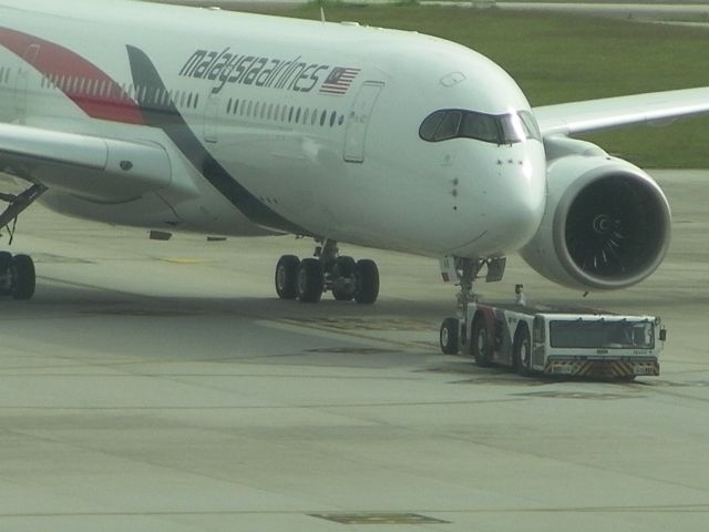 Airbus A350-900 (9M-MAB) - First A350 for Malaysia Airlines towed to gate for its first revenue flight