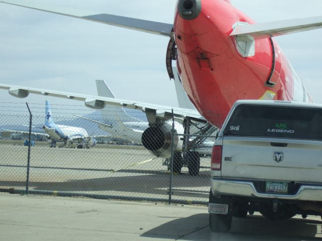 Airbus A321 (TC-AGI) - AtlasGlobal's Bank'O Atlas livery at KTUS, with an Interjet A320 and a Ryanair 737-800 in the background